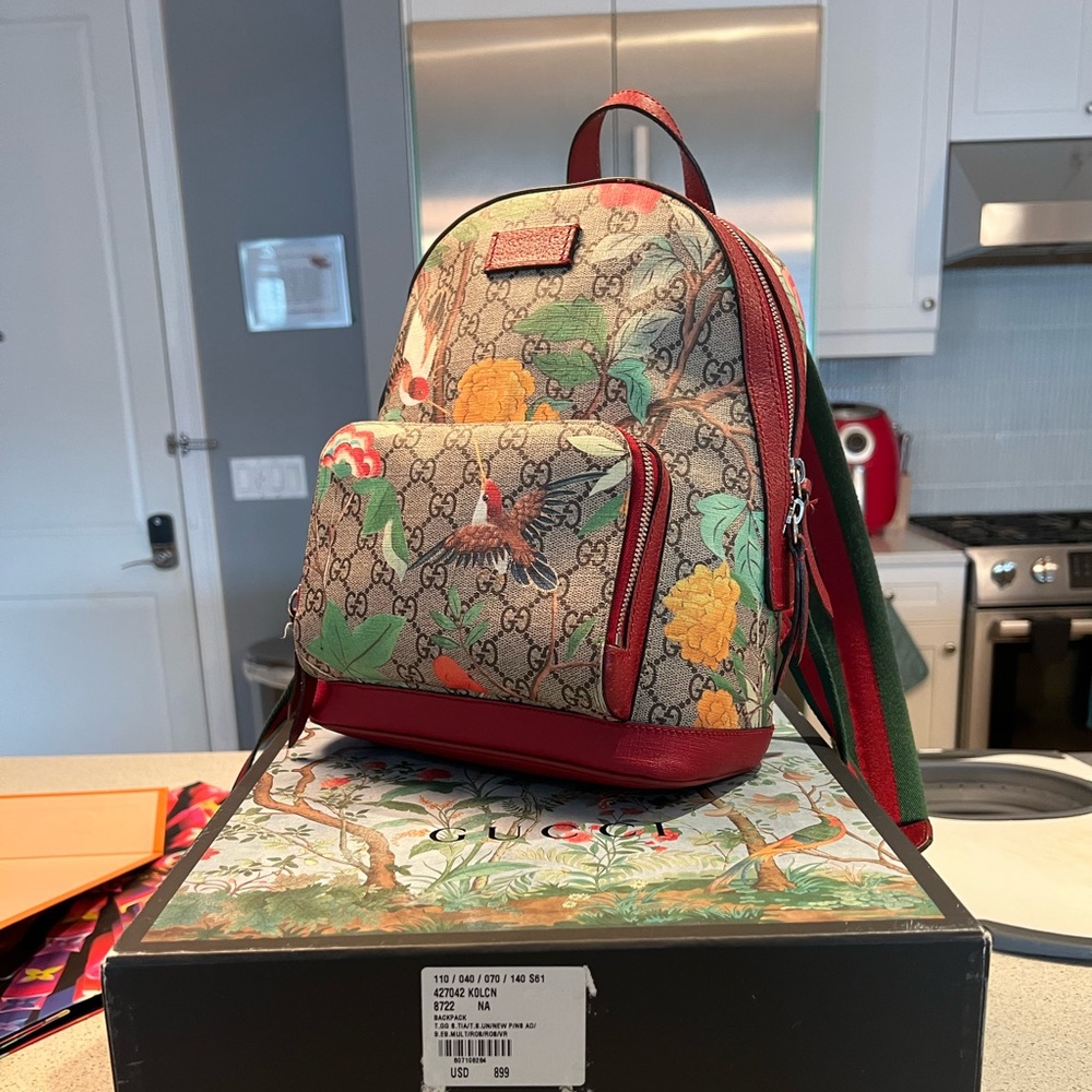 Gucci Floral bookbag.
